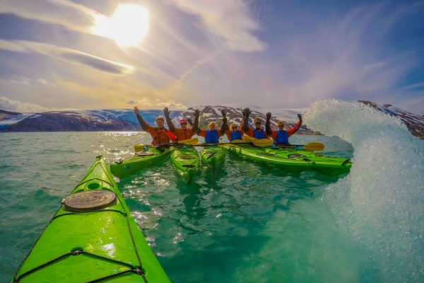 kayaking in the frozen lake at svartisen glacier