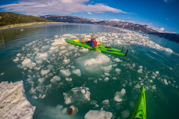 kayaking around floating ice at svartisen glacier